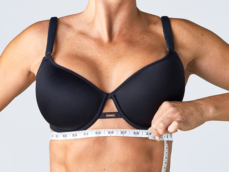 Tape measure showing how to measure under the bust